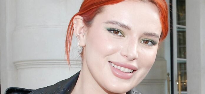 Bella Thorne Wriggles In Wet Mermaid Fishtail For 'Work'