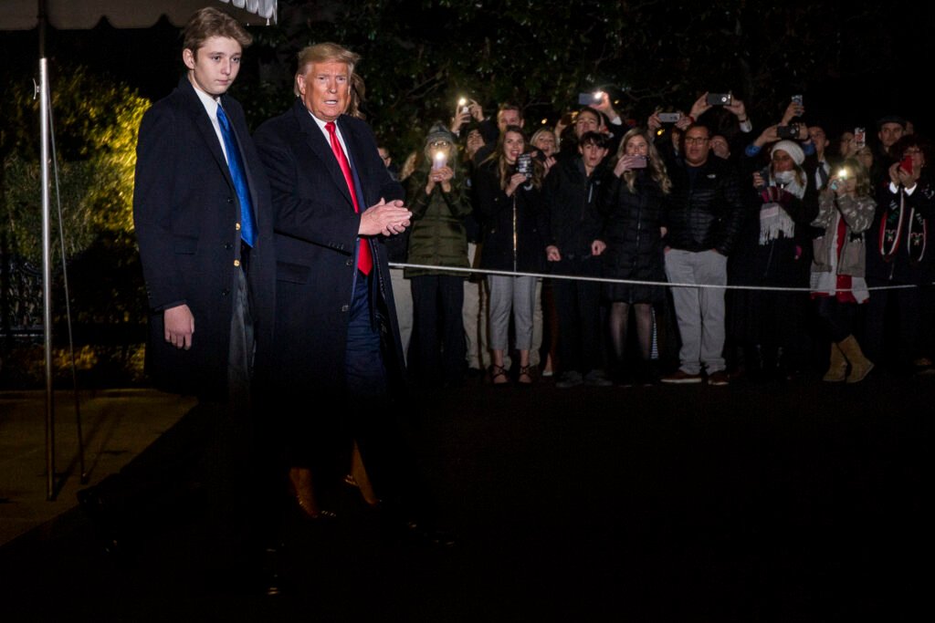 WASHINGTON, DC - DECEMBER 20: President Donald Trump leaves the White House before departing for Joint Base Andrews on December 20, 2019 in Washington, DC.  President Trump will sign S.1790, the "National Defense Authorization act for FY2020" at JBA before traveling to West Palm Beach, FL.  Also pictured is President Trump's son, Barron Trump.  (Photo by Zach Gibson/Getty Images)