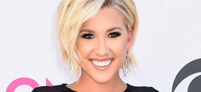 Savannah Chrisley In Braless Minidress Criticized For 'MAGA' Photos In Heels