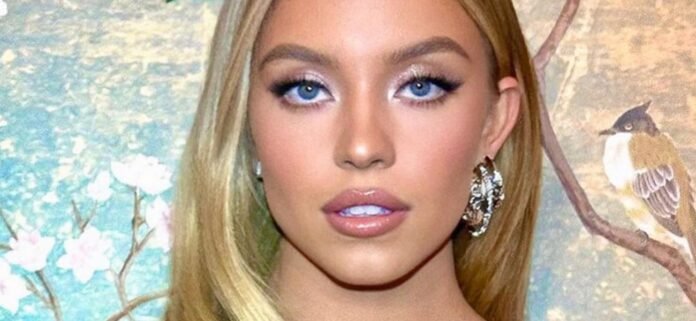 Sydney Sweeney In Plunging Swimsuit Told 'No-One Watching The Makeup'