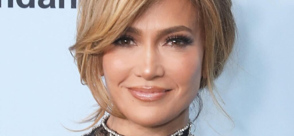 Jennifer Lopez Kneeling In Cheeky Swimsuit Told To 'Act Her Age'
