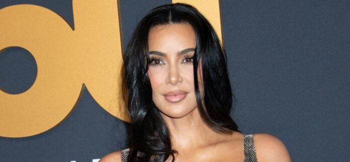 Kim Kardashian Shows Off Her Curves At The Beach In String Bikini