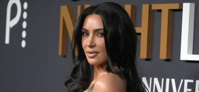 Kim Kardashian Stuns In Zebra-Print Bikini While Facing Defamation Lawsuit