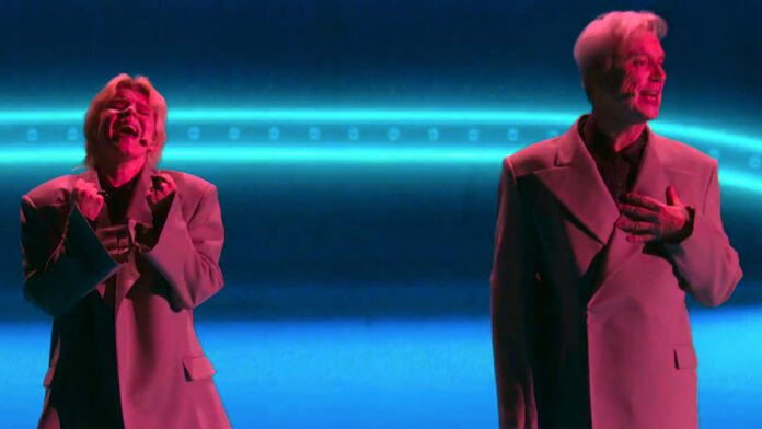 David Byrne Joins Robyn for “Dancing On My Own” at SNL 50th Anniversary Concert: Watch