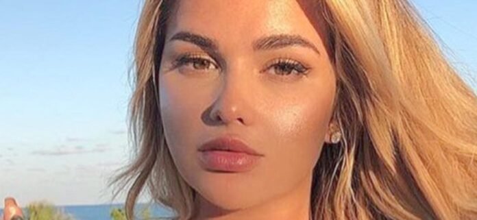 Anastasiya Kvitko Nearly Spills Out Of Her Plunging Top On A 'Happy Sunday'