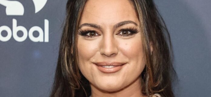 Kelly Brook Highlights 'Fantastic Curves' In Plunging Bikini On Greece Beach