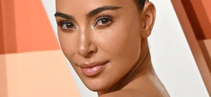 Kim Kardashian Unzipping Her Swimsuit 'Breaks The Internet'