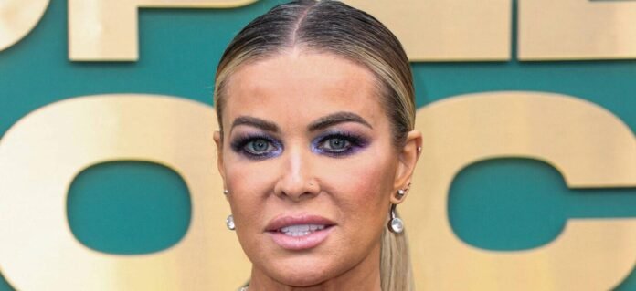 Carmen Electra Turns Heads With Jaw-Dropping Swimsuit Photos At 52