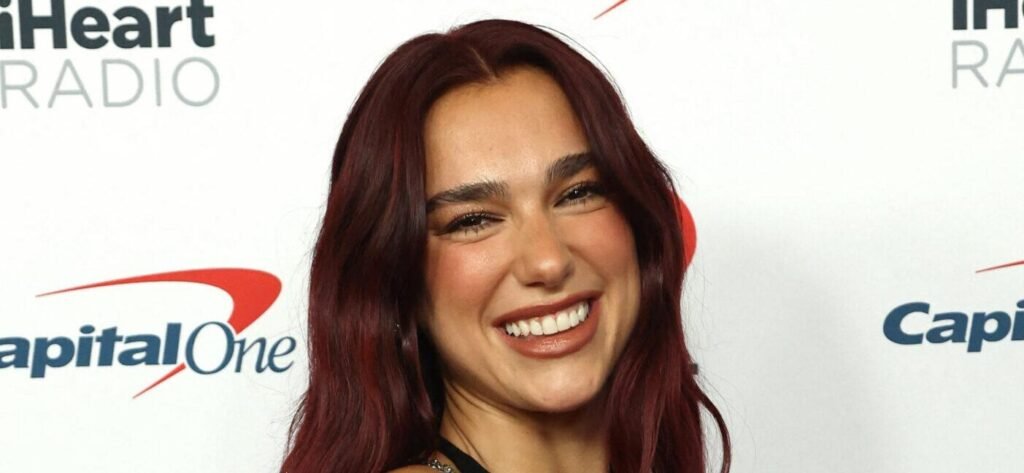 Dua Lipa Masters Effortless Glam In Chic Minidress
