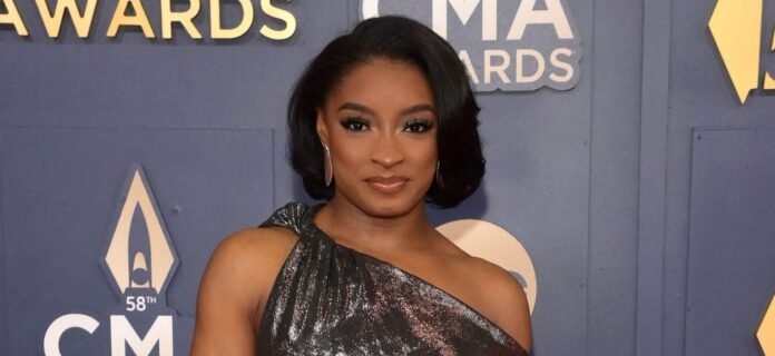 Simone Biles Stuns In Itty Bitty Black Bikini During Vacation Escape