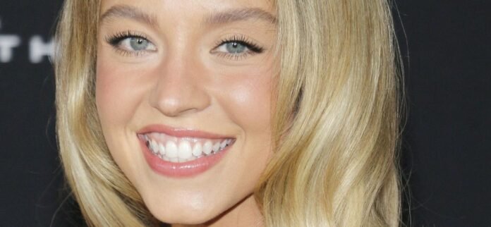 Sydney Sweeney Arches Back In Stringy Underwater Bikini