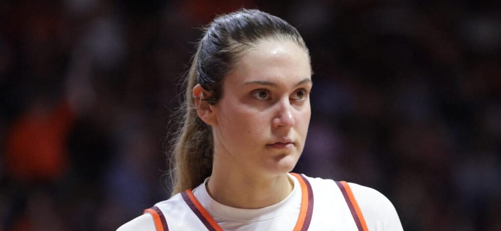 WNBA Star Elizabeth Kitley Drops Jaws In Bold Press Conference Look