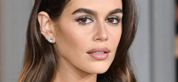 Kaia Gerber Lowers Sweatpants Without Visible Underwear