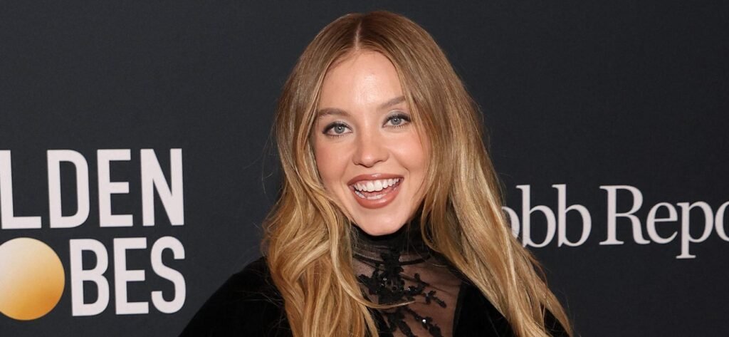 Sydney Sweeney Stuns In Plunging Chocolate Brown Waist-Cinched Suit
