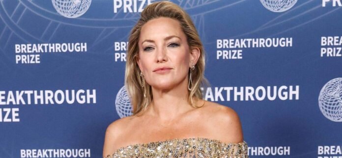 Kate Hudson Stuns In White Swimsuit As She Flashes Eye-Popping Side View