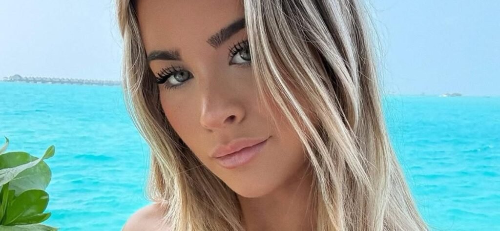 Emily Elizabeth Puts Massive Assets On Display In Itty-Bitty Floral Bikini