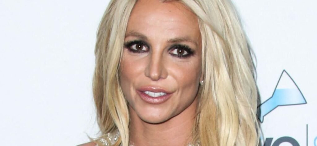 Britney Spears Arches Back In String Bikini While Soaking Wet On The Beach
