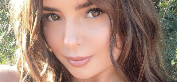 Demi Rose Nearly Pops Out Her Glitter Bikini From An Outdoor Hot Tub