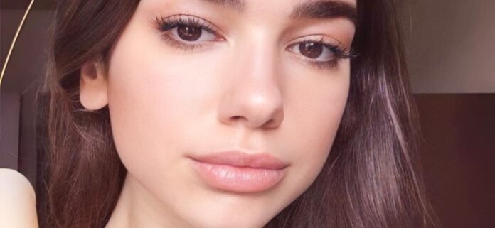 Dua Lipa Stuns In Wet Glitter Bikini With Her Sister In A Swimming Pool