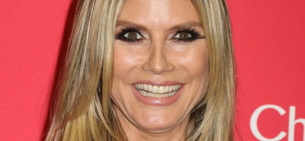 Heidi Klum Thrills With Topless Sunbathe In Poolside Bikini Bottoms