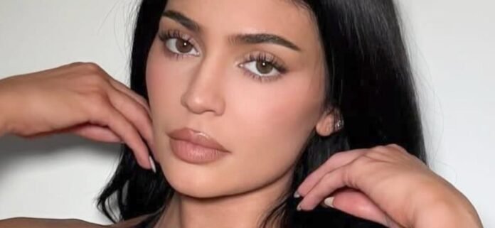 Kylie-Jenner-white-wall-1300.jpg Kylie Jenner Showering In Gold Bikini Shamed For Her 'Thunder Thighs'