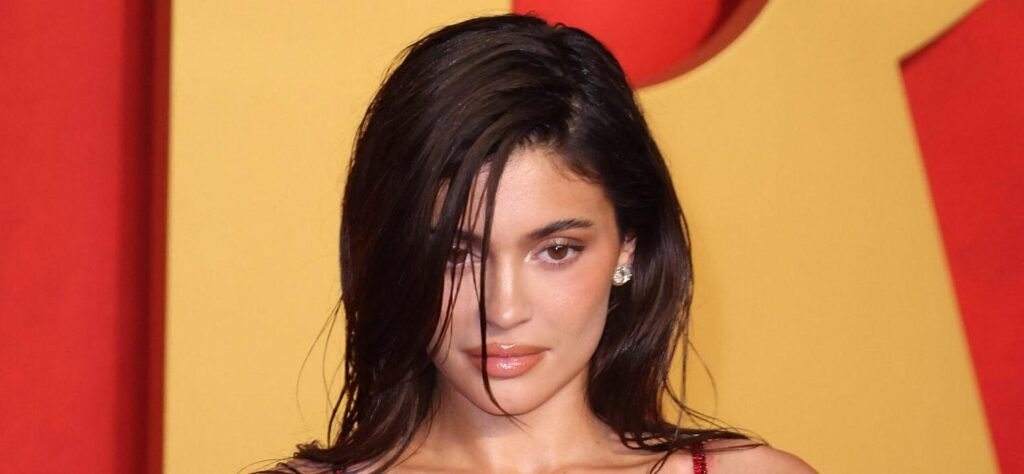 Kylie Jenner Raises Temperatures At The Beach In An Itty-Bitty Pink Bikini