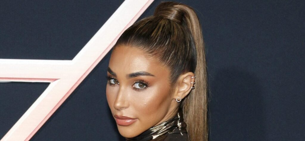 Justin Bieber's Ex-Girlfriend Flaunts Stellar Physique In An Orange Bikini