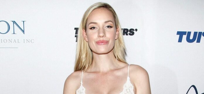 Paige Spiranac Bursts Out Of Her High-Cut Swimsuit