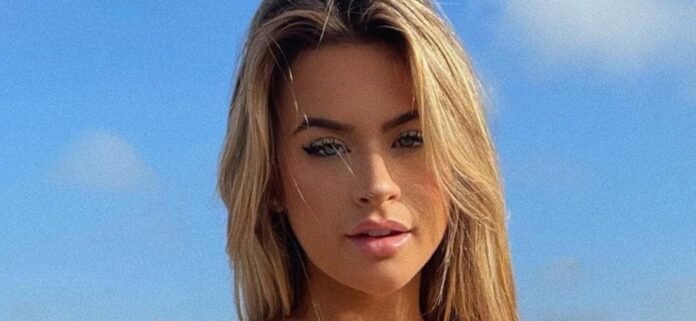 Emily Elizabeth Puts On A Busty Display In Stunning Red Bikini Photo