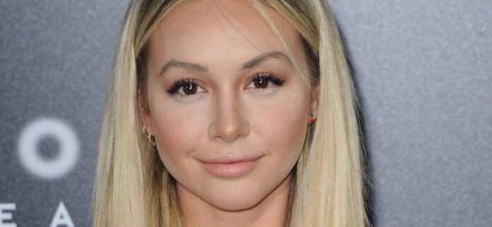 Corinne Olympios Leaves Fans Begging For 'Her Digits' With Bikini Bombshell Moment