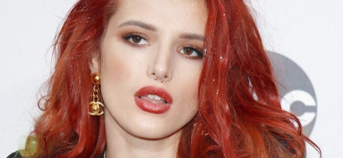 Bella Thorne Shows Off Her Oranges In Skimpy Bikinis For 'Spring Breakers'