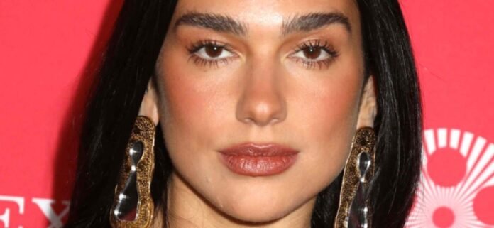 Dua-Lipa-25-cpt-1300.jpg Dua Lipa Popping Out Of Her Skimpy Bikini Told Swimwear Doesn't 'Fit'