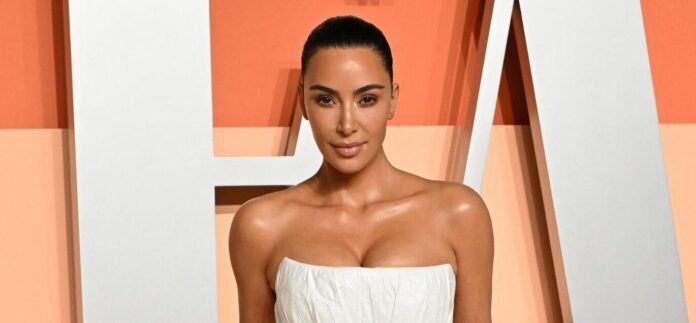 Kim Kardashian In Teeny Tiny Black Bikini Calls For A 'Beach Party'
