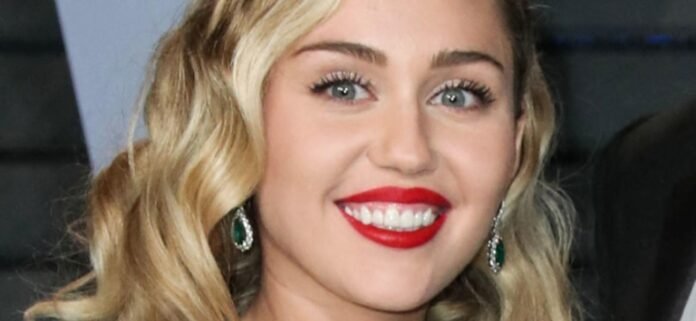 Miley Cyrus Sparks Complaints In See-Through Braless Dress In Paris
