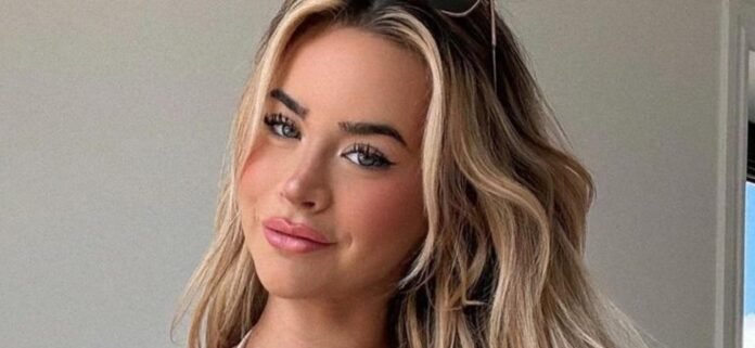 Emily Elizabeth In A Tiny Black Bikini Teases 'New Content'