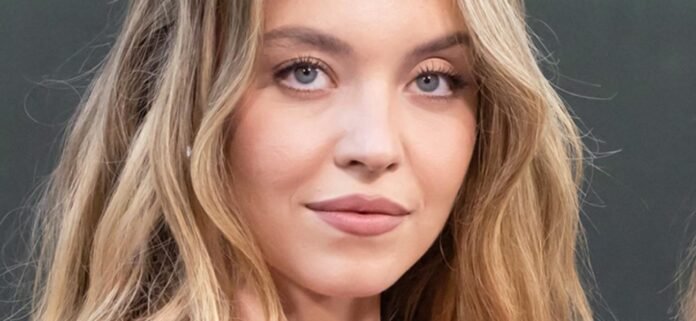 Sydney Sweeney Sparks Complaints In Tight Swimsuit And Cowboy Hat