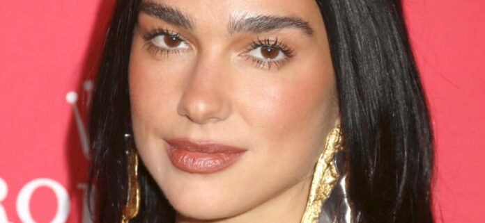 Dua Lipa Enjoys 'Breakfast In Paris' While Braless In High Heels