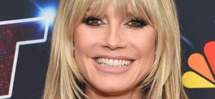 Heidi Klum Exposes Topless Chest For 'Honeymoon' Swim
