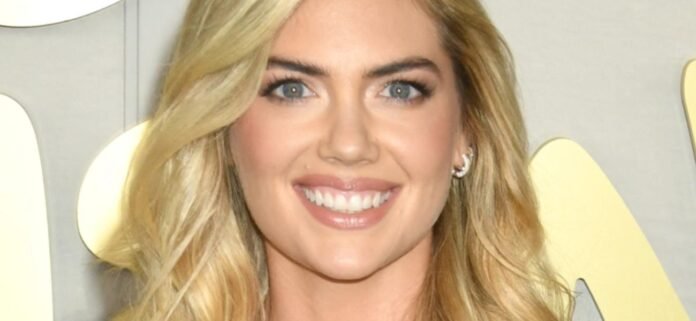Kate Upton In Plunging Bikini Highlights Her 'Flotation Devices' In The Ocean