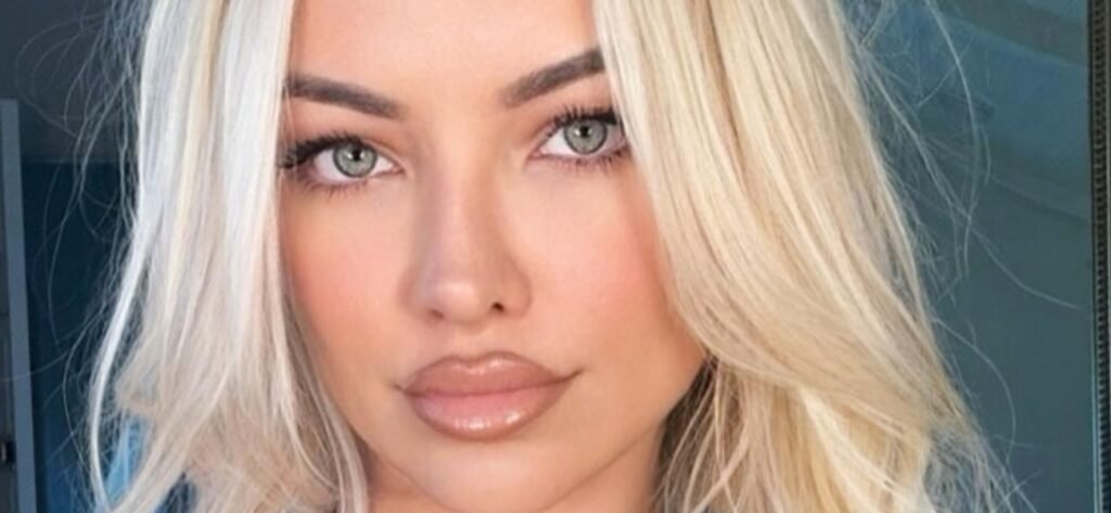 Lindsey Pelas Thrills In Plunging Swimsuit And Heels With 'Staring Contest'
