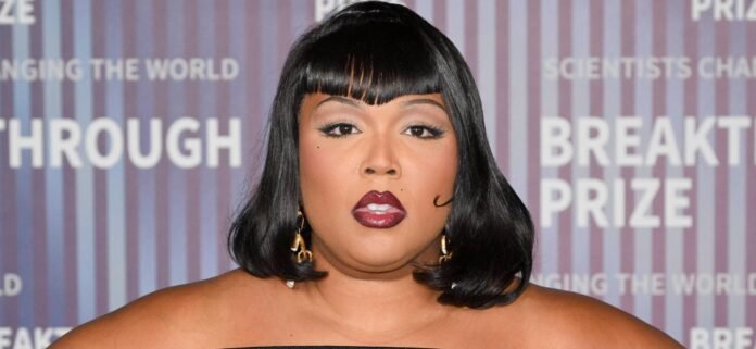 Lizzo In 'Baywatch' Swimsuit Is Criticized For Her ‘Meat Hanging Out’