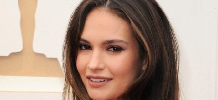 Lily James Lounging On The Beach In Tiny Bikini Says 'Silence Is Sexy'