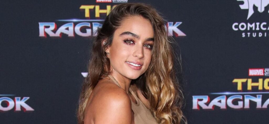 Sommer Ray Enjoys Wine At The Beach In Tiny Animal-Print Bikini