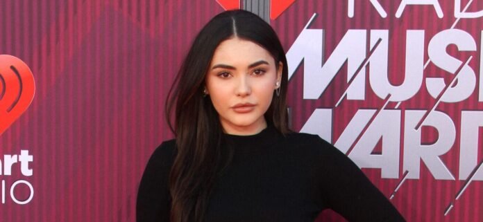 Atiana De La Hoya In A Tiny Green Bikini Looks 'Hotter Than Alabama'