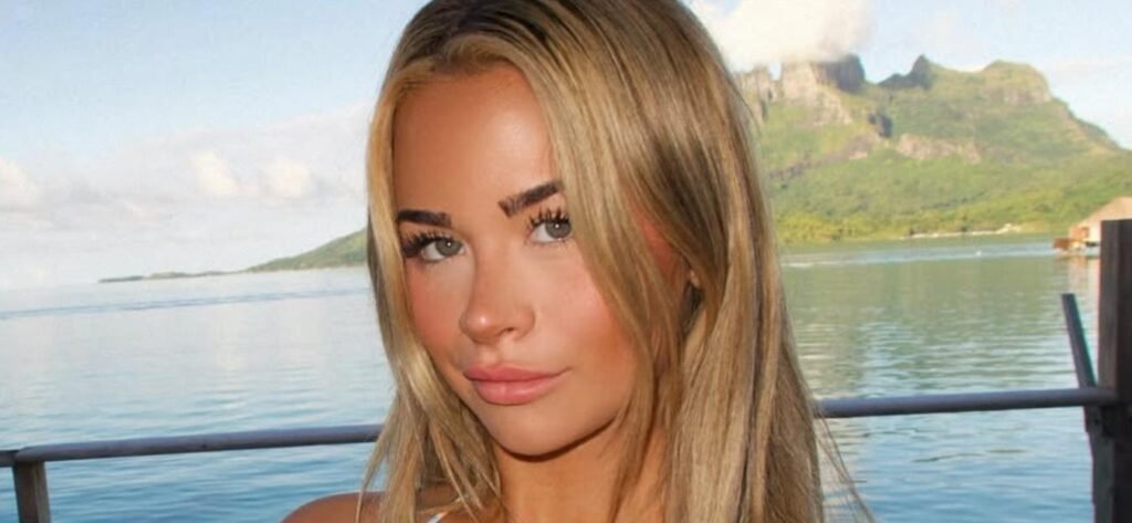 Emily Elizabeth Pops Her Bikini Buns Out For A Beach Bicycle Ride