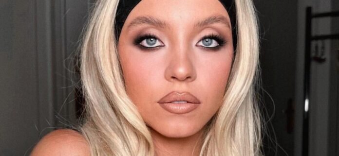 Sydney Sweeney In Plunging Braless Dress Asked Why She Looks 'Sad'