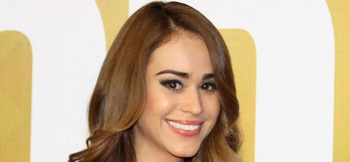 Yanet Garcia In Bronze Bikini Is 'Definitely The Hottest Weather Girl'