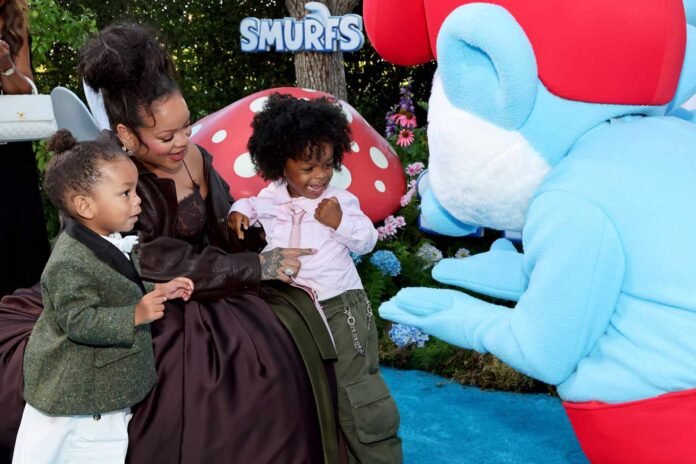 Pregnant Rihanna Attends 'Smurfs' L.A. Premiere with Sons RZA, 3, and Riot, 1