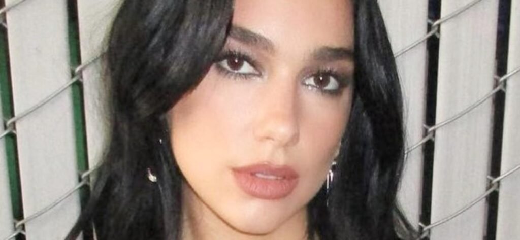 Dua Lipa Gets Her 'Vitamin Sea' In Flirty White Bikini