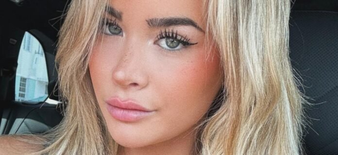 Emily Elizabeth In Island Girl Bikini Shows Off Her 'Coconuts' By The Ocean